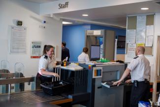 Staff at reception desk in Low Moss