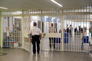 Prisoners and guards at the hall gate in Low Moss