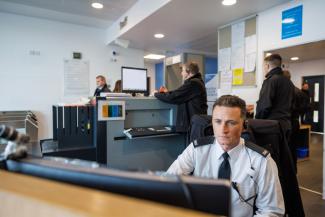 Staff at reception desk in Low Moss