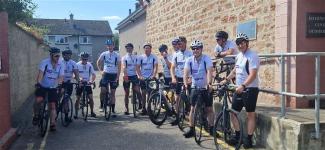 group of cyclists on bikes