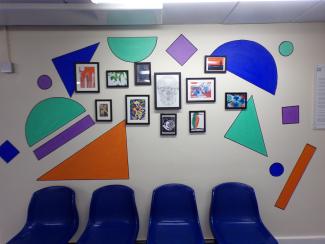 artwork displayed on the wall