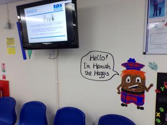 Painting of 'Hamish the Haggis' on the wall