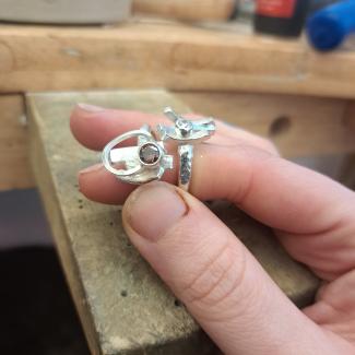 silver jewellery being displayed