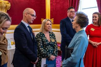 Prison Officer receiving award from Princess Anne