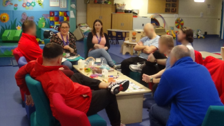 group sitting round table