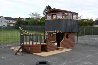 Wooden pirate ship in childrens play area