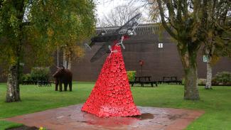Lancaster bomber and poppy metal sculpture