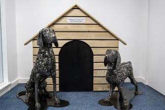 statues of dogs made from scrap metal